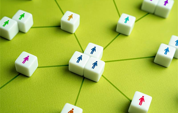 Image of A group of colleagues is collaborating in a modern office setting